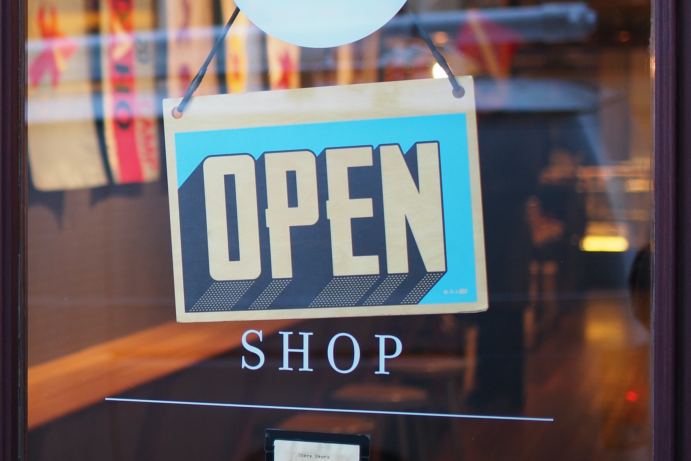 Open shop sign representing farmgate retailers in Ontario