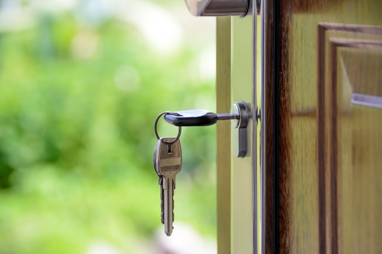 photo of keys in door lock representing the sale of property by a power of attorney